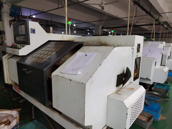 Lathe machine for spst push button switch