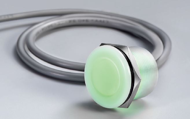 Example of a piezo reset push button switch