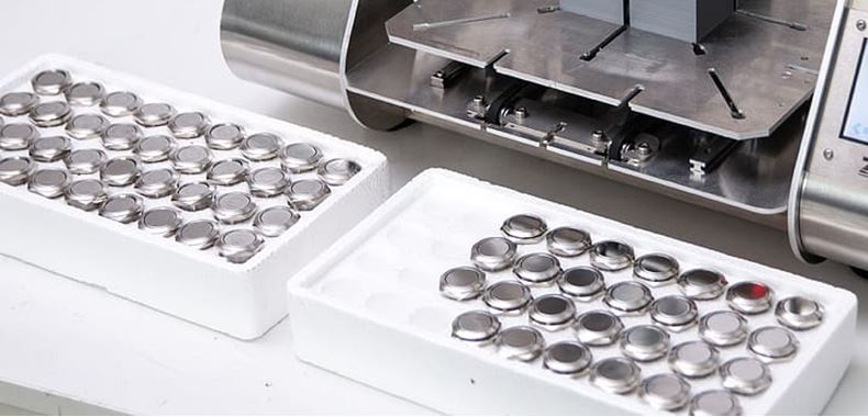 Push button on off arranged in molded tray