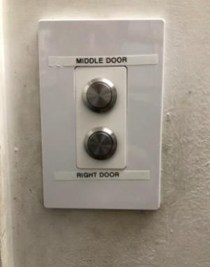 Push button switch on garage door controls