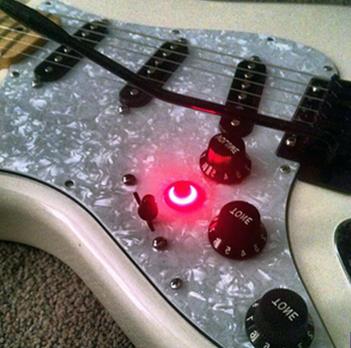 Electric guitar push button switch application
