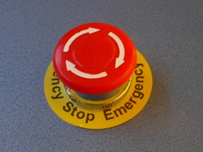 Twist release emergency stop push button