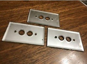 Glass plates for push button switches